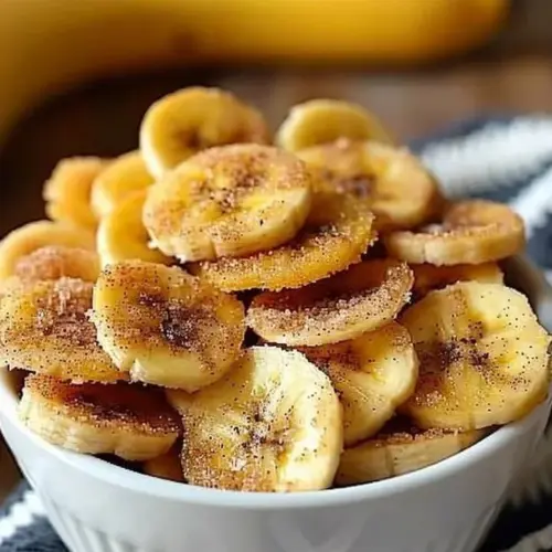 Air fryer cinnamon sugar banana chips served in a bowl