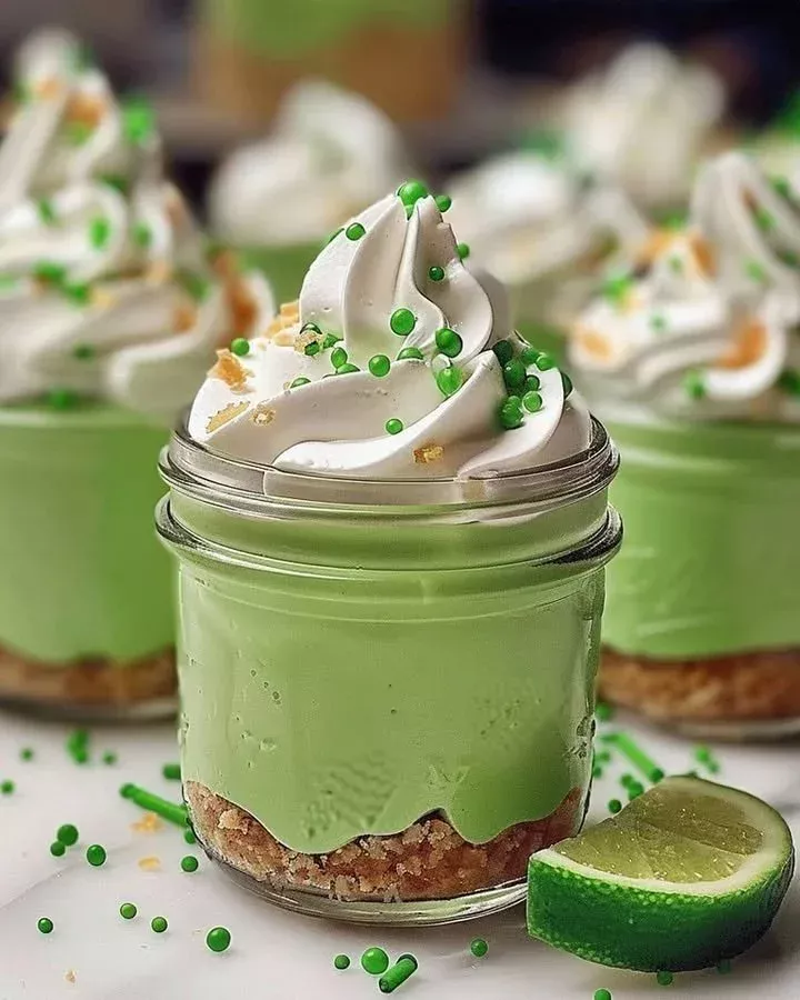 Delicious no-bake key lime cheesecake jars topped with lime zest.